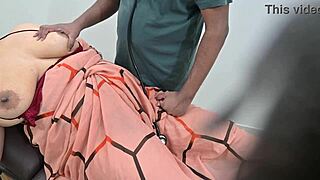 Indian Doctor Checking Lady Patient In Clinic