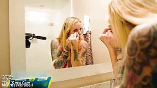 Mature tattooed beauty in barefoot hotel reunion.