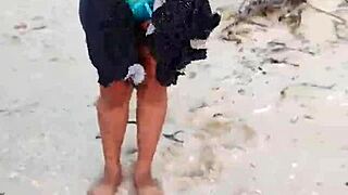 Bold Latina exposes tits and ass on Mexican beach in lingerie