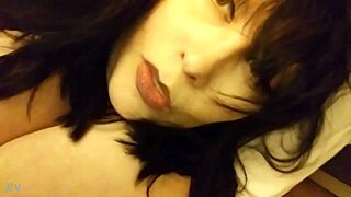 Why is this sexy milf fingering her big tits while masturbating?