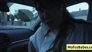 sexy asian hottie plays with natural big boobs in car