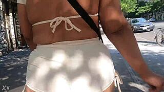 Walking in public with mini shorts, flashing ass for voyeurs.