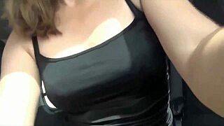 Blonde teen enjoys private time in car