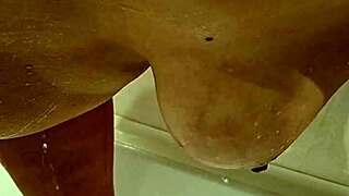 Young milf showcases her big tits in this scene