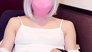Masked beauty in crossdressing pleasures herself while streaming