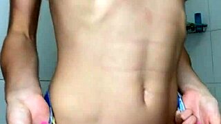 Horny hottie masturbates with dildo in bathroom shower to crazy orgasm