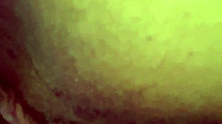 Tattooed woman teases her wet puffy pussy with toys.