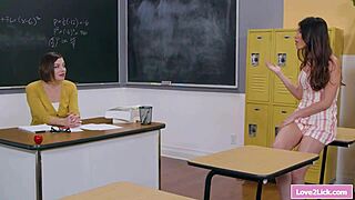 I can't believe the lesbian teacher is rubbing her student's pussy so passionately
