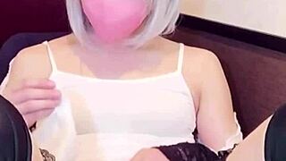 Masked beauty in crossdressing pleasures herself while streaming