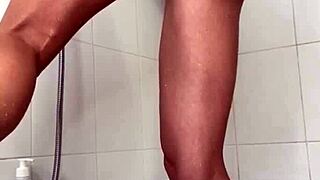 Horny hottie masturbates with dildo in bathroom shower to crazy orgasm