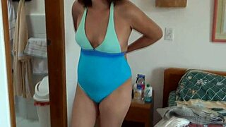 beautiful mature latina shows off in bikini on beach