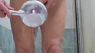 I pleasure myself under the shower with the head