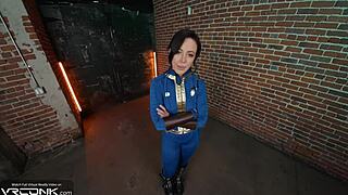 Horny brunette Lucy in Fallout cosplay sucks and rides monster cock anally.