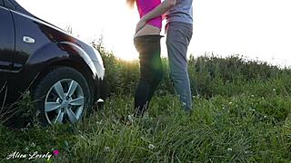 The taxi driver bends the blonde over by the car at sunset for hard fucking.