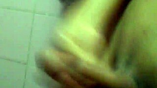 This young guy is casually jerking off in a solo masturbation session.