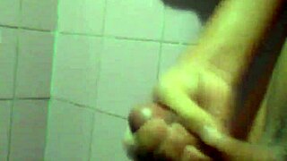 This young guy is casually jerking off in a solo masturbation session.