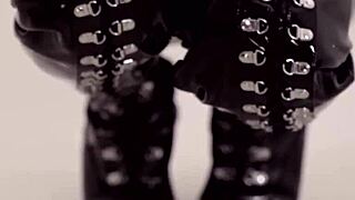 Ebony shemale gives blowjob to big cock in latex