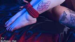 playful rotten venus tickles bound bia's perfect feet.