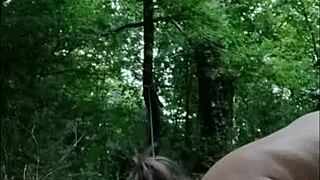 Boldly chaining and humiliating French milf slave in forest with dildo and slapping