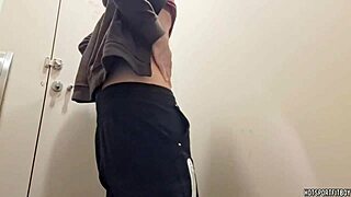 Hunky stud teases in public bathroom