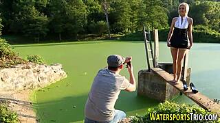 The weird old slut is fucking and peeing outdoors with monster cock