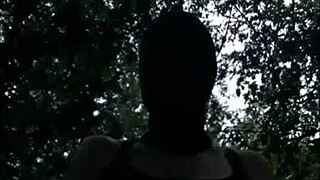 Boldly chaining and humiliating French milf slave in forest with dildo and slapping