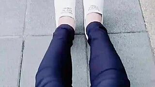 Chinese crossdressing ladyboy masturbates outdoors in stockings during midday urge.