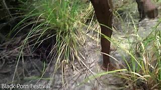 skinny african tribe woman with narrow ass works outdoor in ebony setting