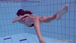 I love how Lucy slowly takes off her bikini in the pool teasing with her hairy body during solo underwater bathing