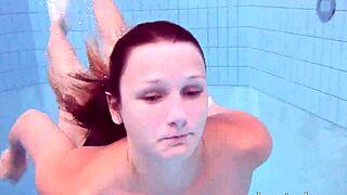 I love how Lucy slowly takes off her bikini in the pool teasing with her hairy body during solo underwater bathing