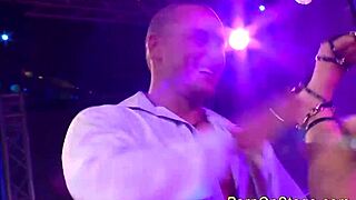 Hey, check out this wild threesome orgy happening right on the public stage