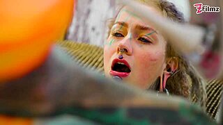 hey, check out this tattooed girl going solo with a big dildo in sexy fishnets, high heels, and stockings... her petite frame and piercings make it wild