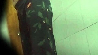 Spying on my cute Colombian stepmom shaving her tight pussy outdoors