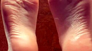 oh man, this girl is just applying some lotion to her feet smoothly