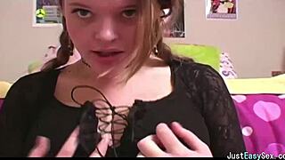 pigtailed brunette teases and fondles her massive tits in solo play.