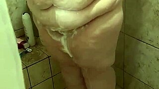 Curvy amateur bbw wife gets caught solo in shower with natural tits