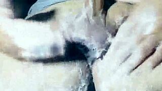 Experience the serene moment as Bad Wolf28 showers gracefully in this captivating video