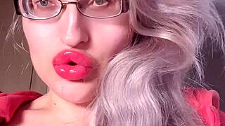 I worship bimbo girl with red lips and lipgloss in webcam domination session