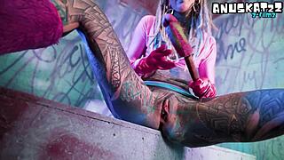 this tattooed goth punk girl does solo double penetration with toys, fingering her ass and pussy for orgasm