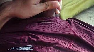 Watch this young guy enjoy a solo session in his bedroom with moans and a big cumshot