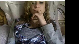 look at this cute teen with perfect tits stripping and teasing...