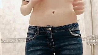 This pissing girl desperately needs to go so she undresses and pees in the bath through her panties then squeezes them out.