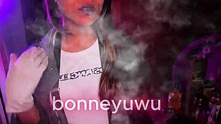 Bonneyuwu the petite 18-year-old in pigtails and miniskirt gets paid by a 36-year-old bartender to suck on a dildo in her solo session