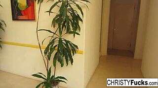 Hot Christy Mack with big tits and tattoo plays with her wet pussy on the kitchen counter masturbating solo until aroused