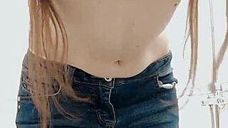 This pissing girl desperately needs to go so she undresses and pees in the bath through her panties then squeezes them out.