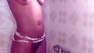 Crazybitch takes a shower with her dildo before facing the biggest dick from Ghana in Nigeria