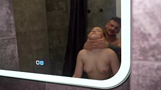 redhead gymnast slips into a steamy shower, teasing with acrobatic moves and deep passion.