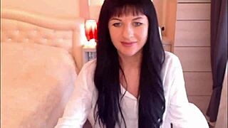 Small tit brunette Helga Muah aka Jessy in lingerie and stockings does sexy striptease and tease.