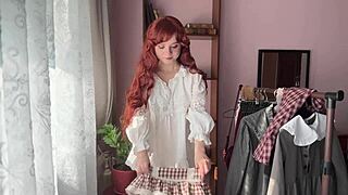 The library girl with curly red hair slips into nerdy lingerie for a petite solo tease