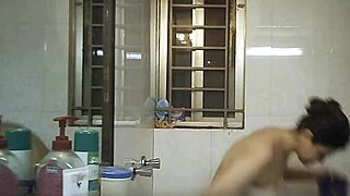 Hey, check out this hidden shower voyeur moment with a curvy Indian lady